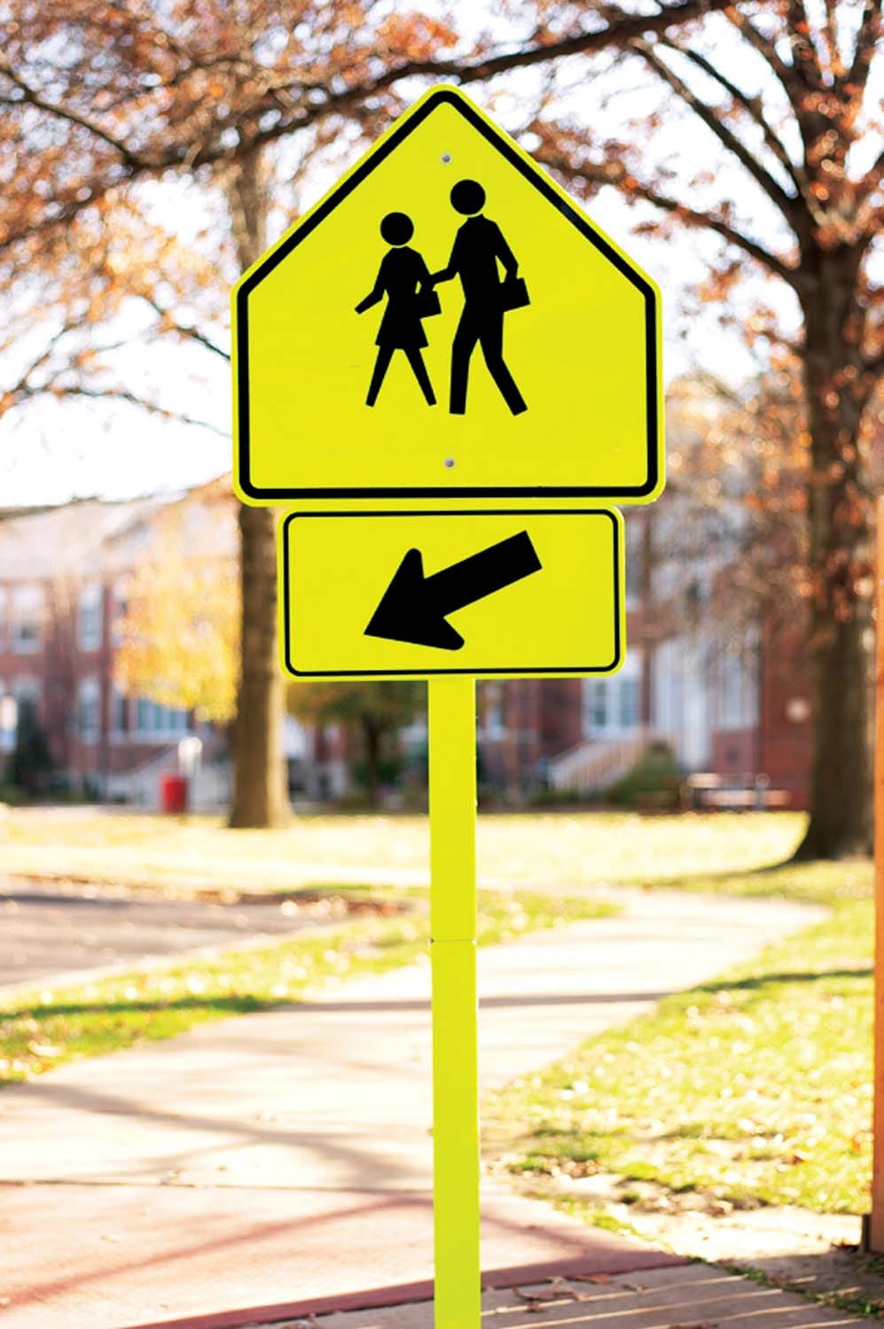 W16 7r school crossing right arrow sign