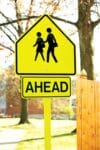 W16 9 school crossing ahead sign